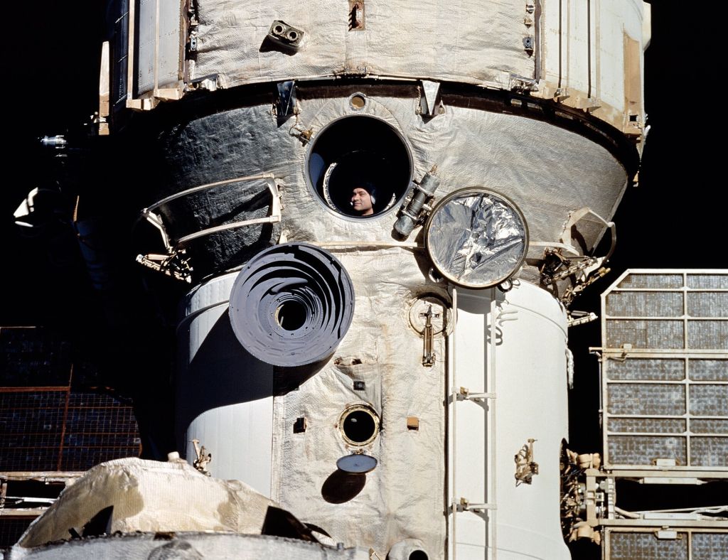 Cosmonaut_Polyakov_Watches_Discovery's_Rendezvous_With_Mir_GPN_2002.jpg